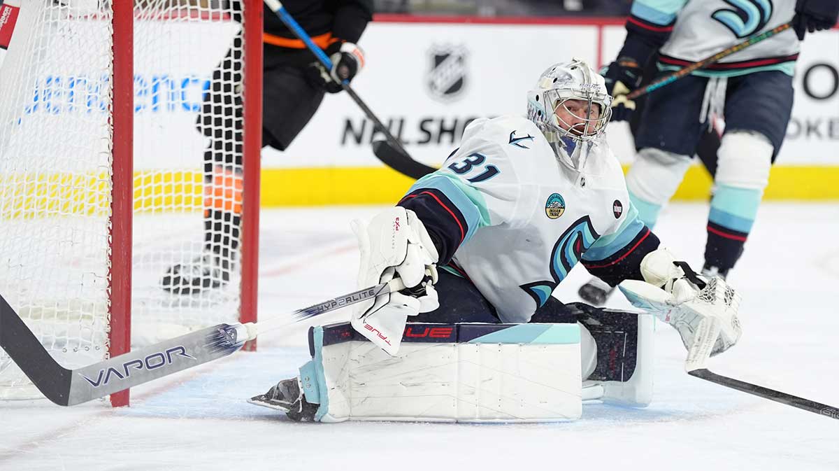 Seattle Kraken goalie Philipp Grubauer (31) defends the net against the Philadelphia Flyers in the second period at Wells Fargo Center
