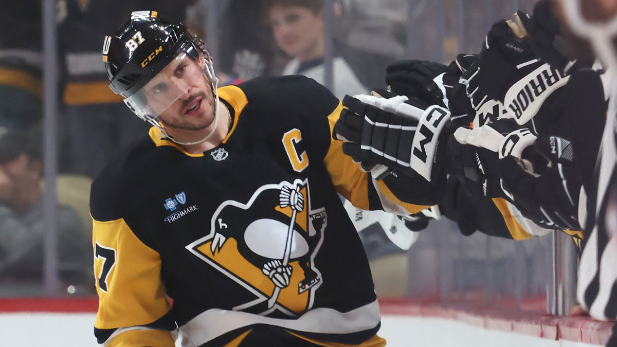 Pittsburgh Penguins center Sidney Crosby (87) celebrates his goal with the Penguins bench against the Columbus Blue Jackets during the second period at PPG Paints Arena.
