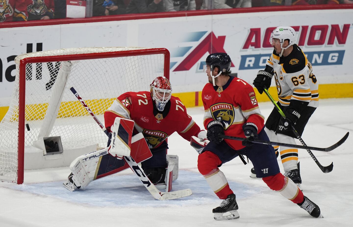 Bruins captain Brad Marchand (63) is aside the crease to watch David Pastrnak's shot slip past a screened Sergei Bobrovsky.