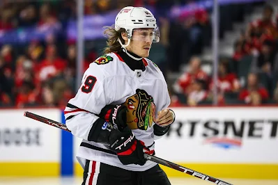 Chicago Blackhawks forward Tyler Bertuzzi reacts during 2024 game.