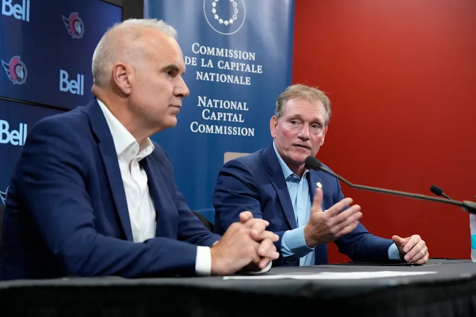 President and CEO of the Ottawa Senators Cyril Leeder, right, looks to Chief Executive Officer of the National Capital Commission Tobi Nussbaum during a news conference on Sept. 20, 2024 in Ottawa.