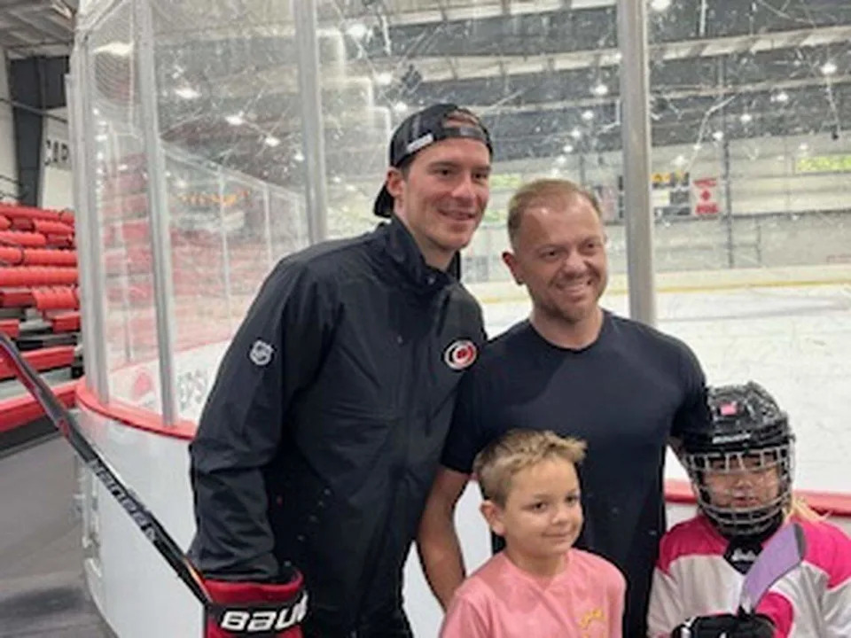 Carolina Hurricanes forward Andrei Svechnikov poses for a photo after session of the team’s First Goal Program at Invisalign Arena in Morrisville on August 9, 2025.