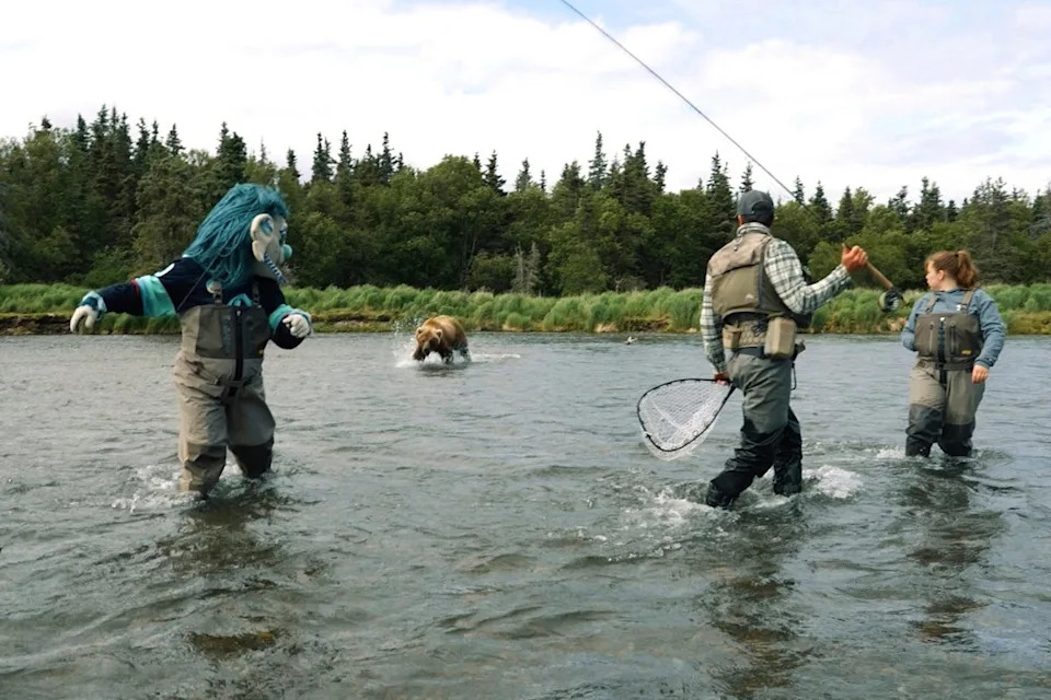 The bear charged at Seattle Kraken’s blue-haired troll mascot, named Buoy, and forward John Hayden in Katmai National Park