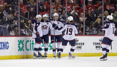 Columbus Blue Jackets right wing Kirill Marchenko, second left, is congratulated by teammates after scoring a goal during the second period of an NHL hockey game against the New Jersey Devils, Tuesday, March 11, 2025, in Newark, N.J. (AP Photo/Adam Hunger)