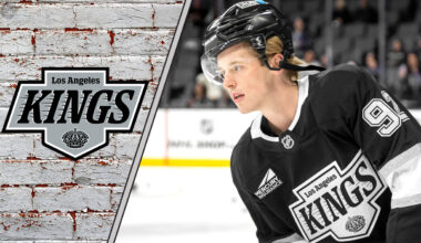 LA Kings defenseman Brandt Clarke skates with the puck during an NHL game