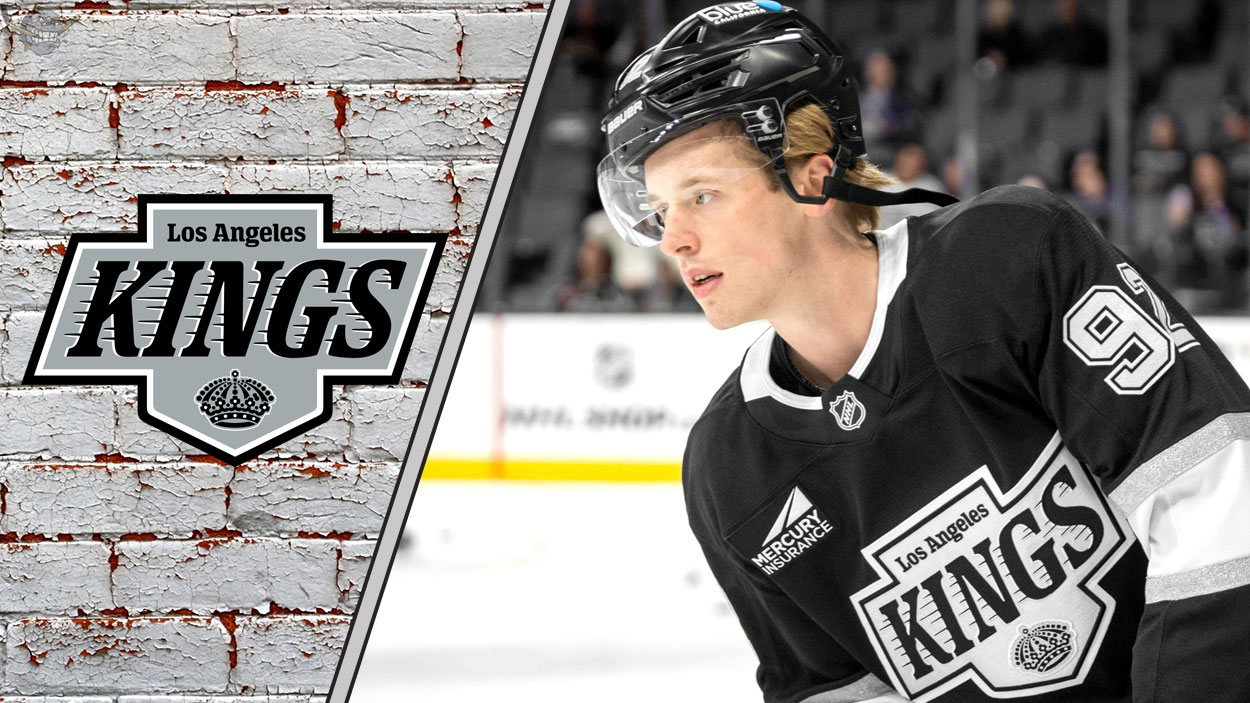 LA Kings defenseman Brandt Clarke skates with the puck during an NHL game