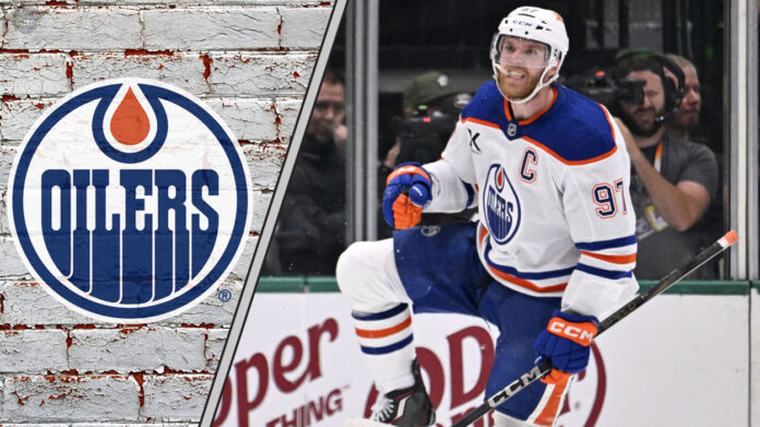 Edmonton Oilers captain Connor McDavid skating in his jersey, celebrating a goal during a game.