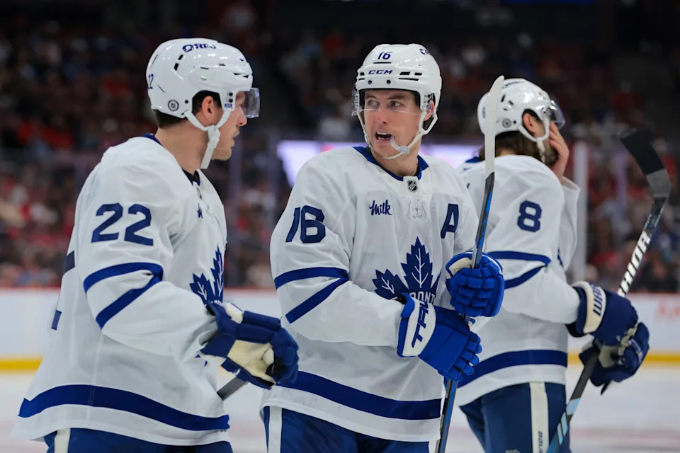 Former Toronto Maple Leafs right wing Mitch Marner (16) talks to his teammates before joining the Vegas Golden Knights in late June.Sam Navarro-Imagn Images