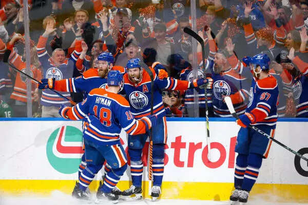 Edmonton Oilers celebrates with teammates after scoring a goal