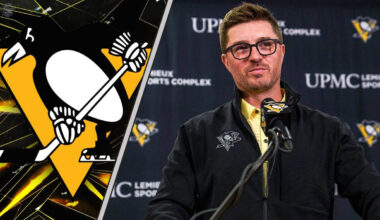 Pittsburgh Penguins GM Kyle Dubas speaking at a press conference, with the team logo in the background