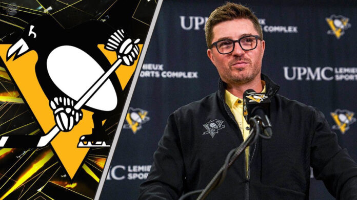 Pittsburgh Penguins GM Kyle Dubas speaking at a press conference, with the team logo in the background