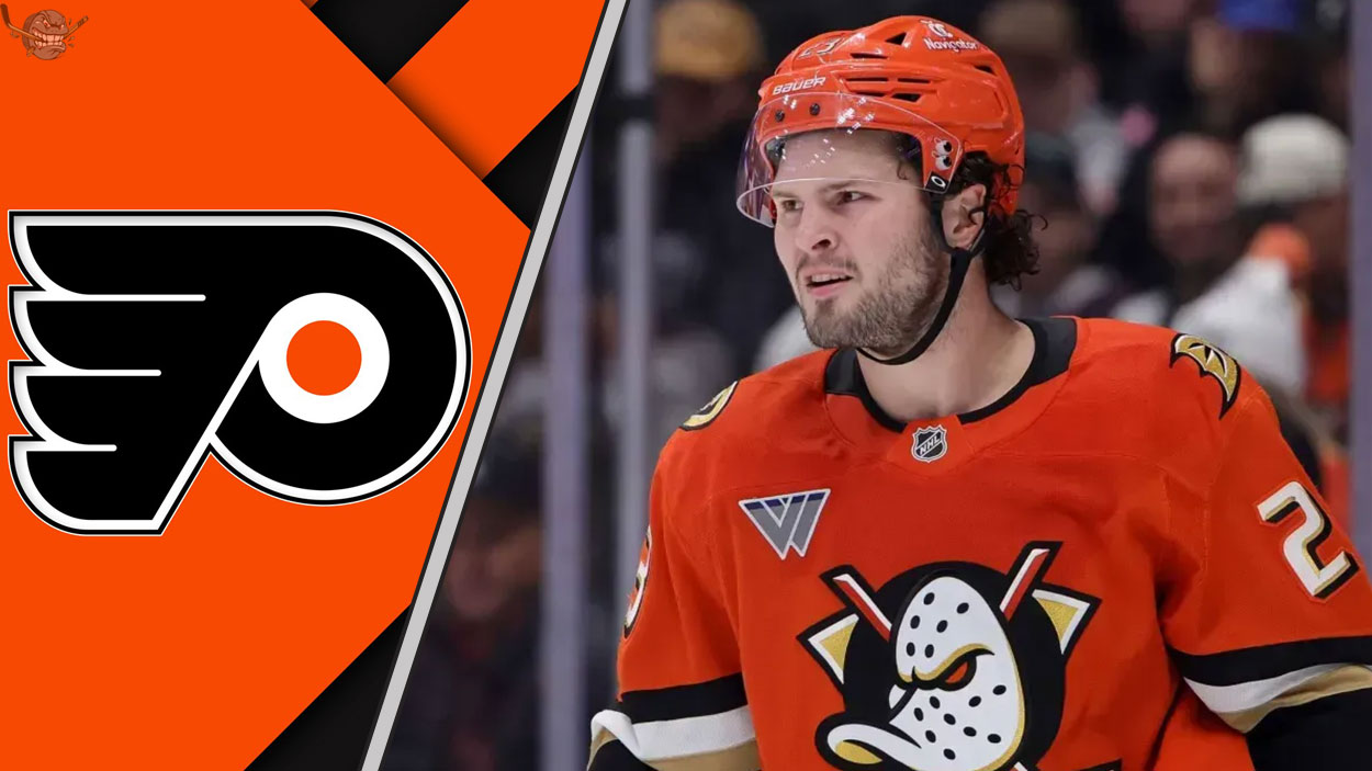 Mason McTavish in an Anaheim Ducks jersey skating with the Philadelphia Flyers logo to the left