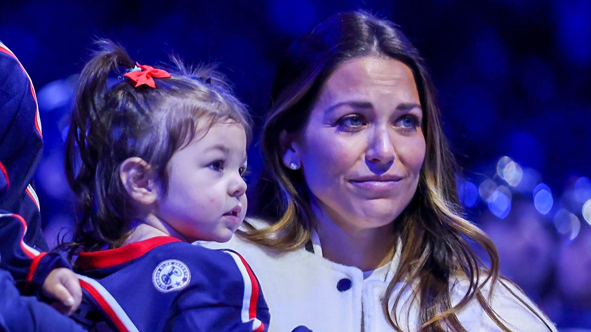 Meredith Gaudreau on ice with daughter, Noa