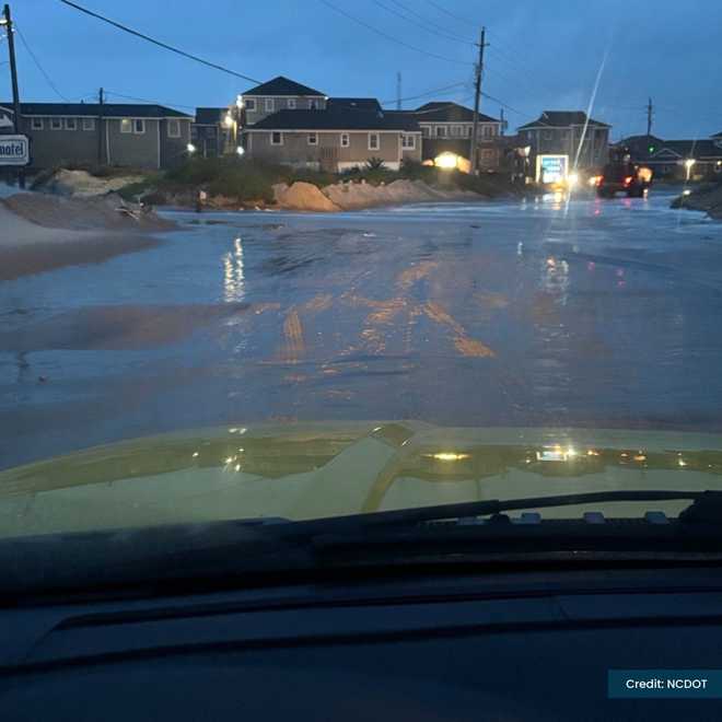 NC DOT image: Water and Sand cover a road in Dare County nc dot image: water and sand cover a road in dare county