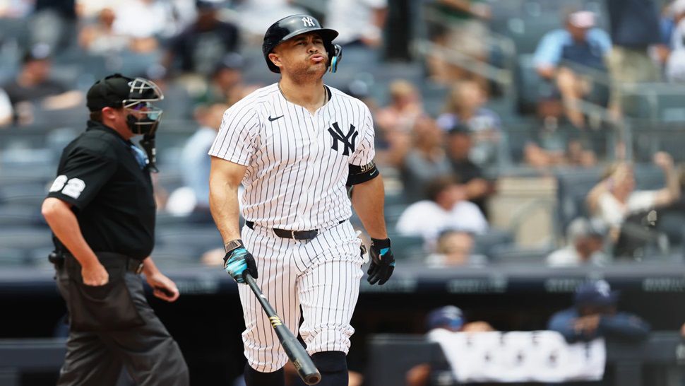 New York Yankees' Giancarlo Stanton reacts after hitting a home run in the first inning of a baseball game against the Tampa Bay Rays, Thursday, July 31, 2025, in New York. (AP Photo/Heather Khalifa)