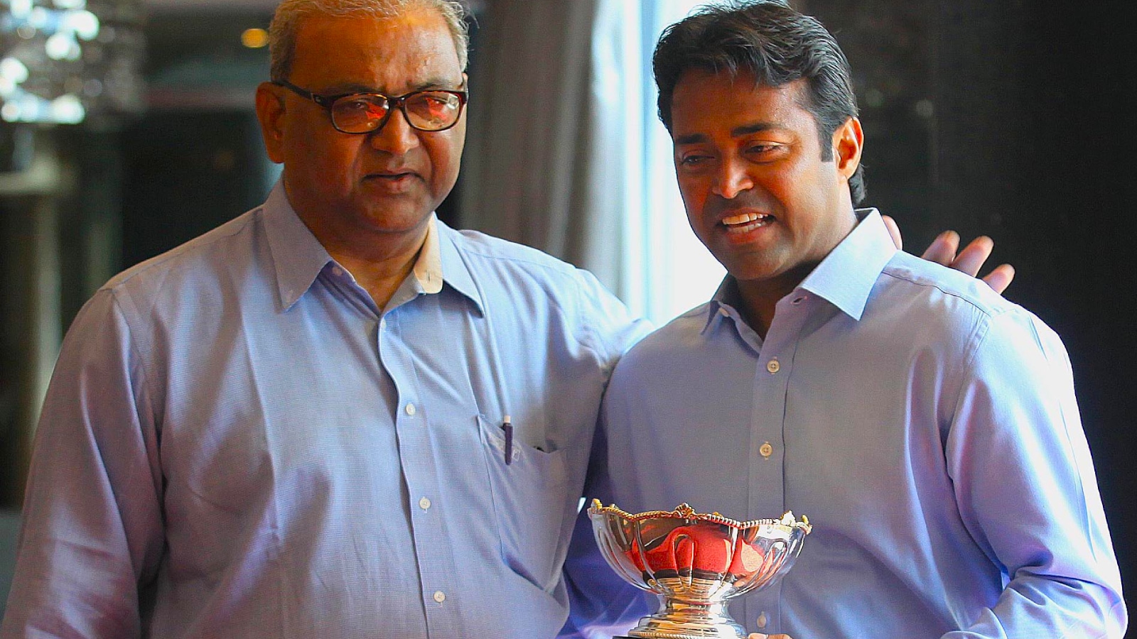 Vece Paes Passes Away at 80: Dr Vece Paes with his son Leander Paes as the tennis ace celebrates his 15th Grand Slam title at a Mumbai hotel. (Express Photo by Ganesh Shirsekar)