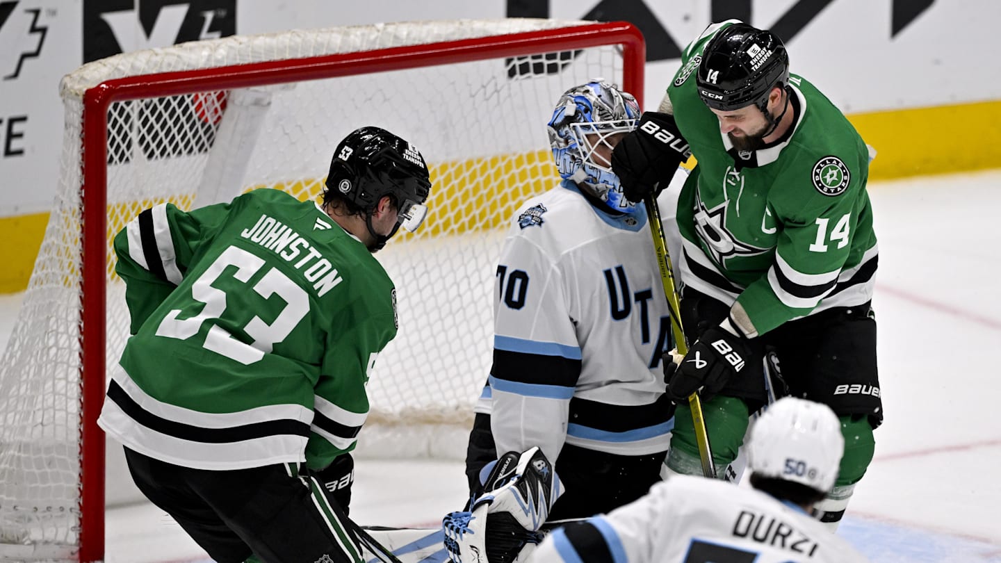 Apr 12, 2025; Dallas, Texas, USA; Dallas Stars left wing Jamie Benn (14) collides with Utah Hockey Club goaltender Karel Vejmelka (70) in the crease during the third period at the American Airlines Center. Mandatory Credit: Jerome Miron-Imagn Images