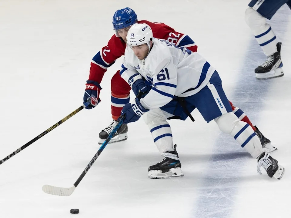 Montreal Canadiens’ Lucas Condotta (82) contains Toronto Maple Leafs’ Jacob Quillan during a pre-season game last year.