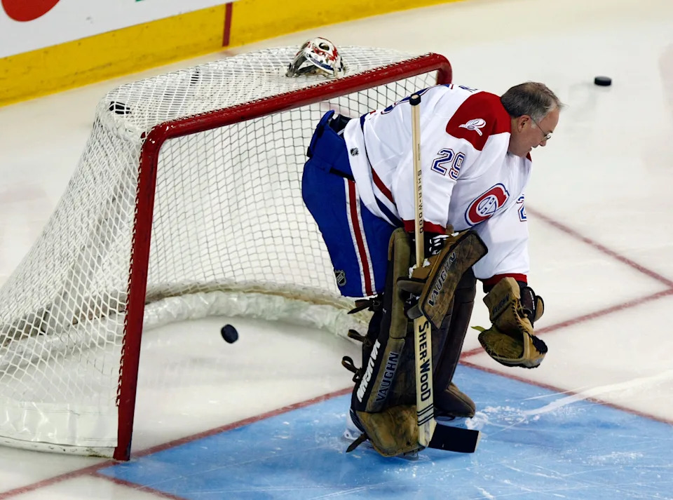 Former Montreal Canadiens goaltender Ken Dryden minds the net during the Canadiens 100th anniversary ceremony.