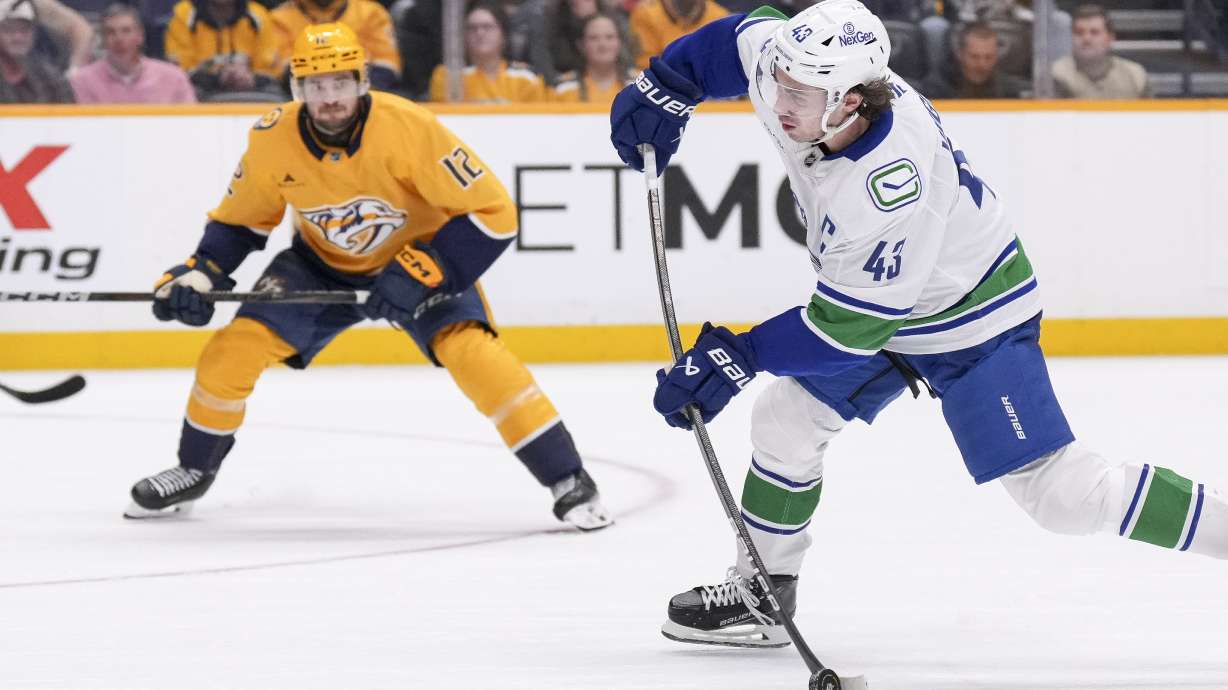 Canucks star defenseman Quinn Hughes sits out against Red Wings because of undisclosed injury