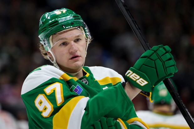Minnesota Wild left wing Kirill Kaprizov (97) skates on the ice during the first period of an NHL hockey game against the Calgary Flames, Saturday, Jan. 25, 2025, in St. Paul, Minn. (AP Photo/Ellen Schmidt)