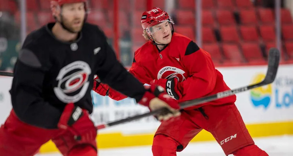 Carolina Hurricanes right win Jackson Blake (53) skates with Jaccob Slavin (74) during practice as they prepare for their Stanley Cup series against the Washington Capitals on Friday, May 2, 2025 at Lenovo Center in Raleigh, N.C. 