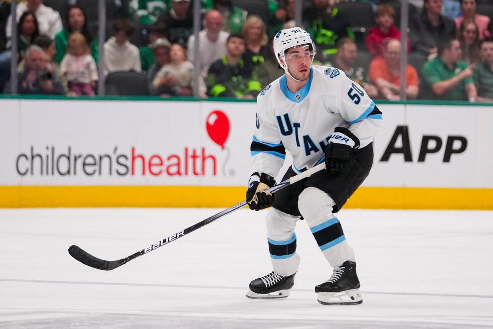 Utah Hockey Club defenseman Sean Durzi skates against the Dallas Stars during the second...