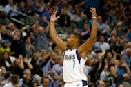 Dallas Mavericks guard Dennis Smith Jr. (1) celebrates after he makes a 3-pointer against...