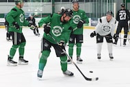 Dallas Stars left wing Jamie Benn takes a shot during a drill in a training camp, on...