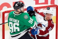 Dallas Stars right wing Mikko Rantanen (96) is blocked by Colorado Avalanche center Jack...