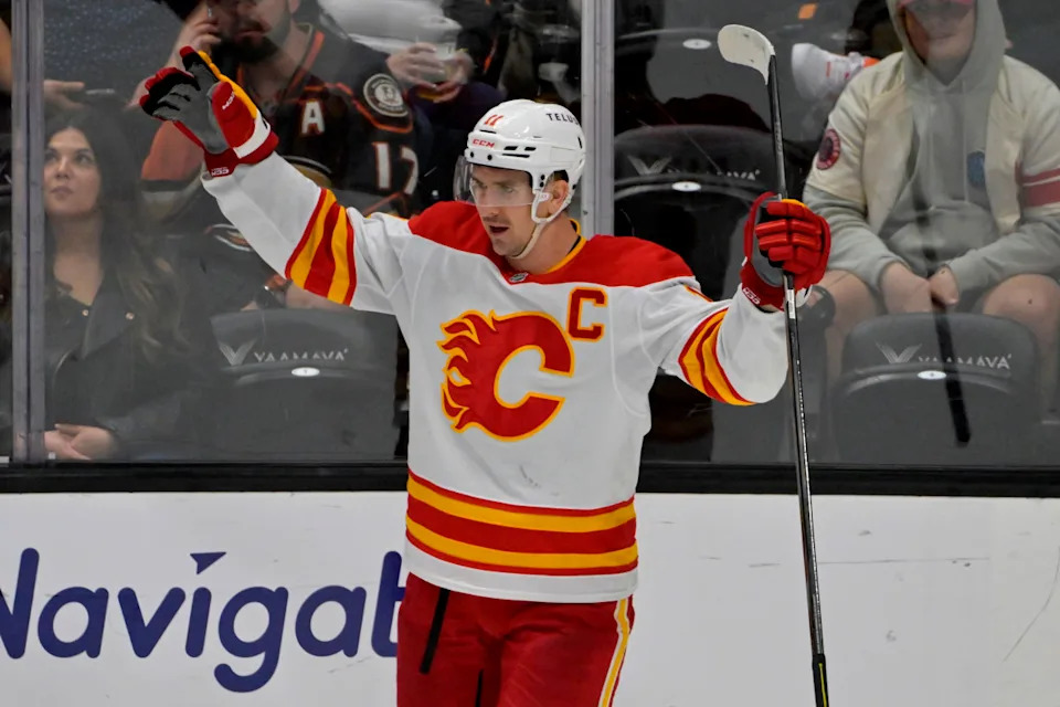 Apr 9, 2025; Anaheim, California, USA; Calgary Flames center Mikael Backlund (11) reacts after scoring a goal during the second period against the Anaheim Ducks at Honda Center. Mandatory Credit: Jayne Kamin-Oncea-Imagn Images