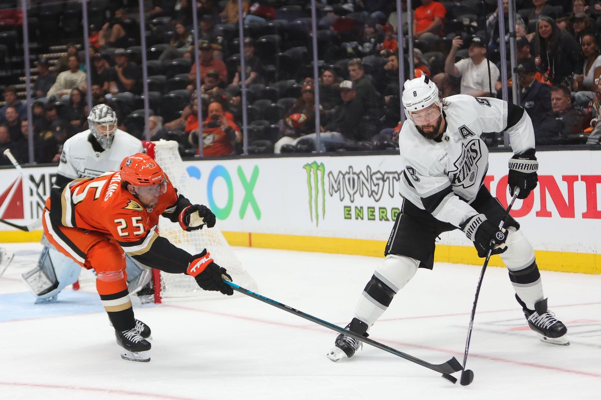 Los Angeles Kings D #8 Drew Doughty and Anaheim Ducks C #25 Ryan Poehling battle for the puck during an NHL game, September 24, 2025 in Anaheim, CA. Los Angeles Kings D #8 Drew Doughty and Anaheim Ducks C #25 Ryan Poehling battle for the puck during an NHL game, September 24, 2025 in Anaheim, CA.