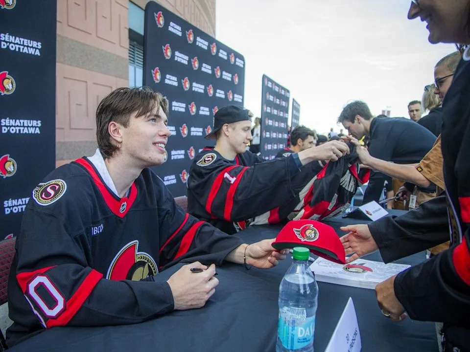 Jackson Parsons was part of the large group of players taking time to sign autographs for fans Sunday at Fan Fest.