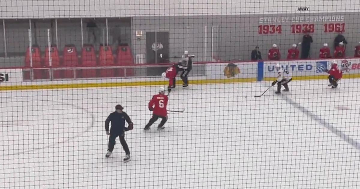 Blackhawks' rookie AJ Spellacy gets cut in the face by a skate training camp
