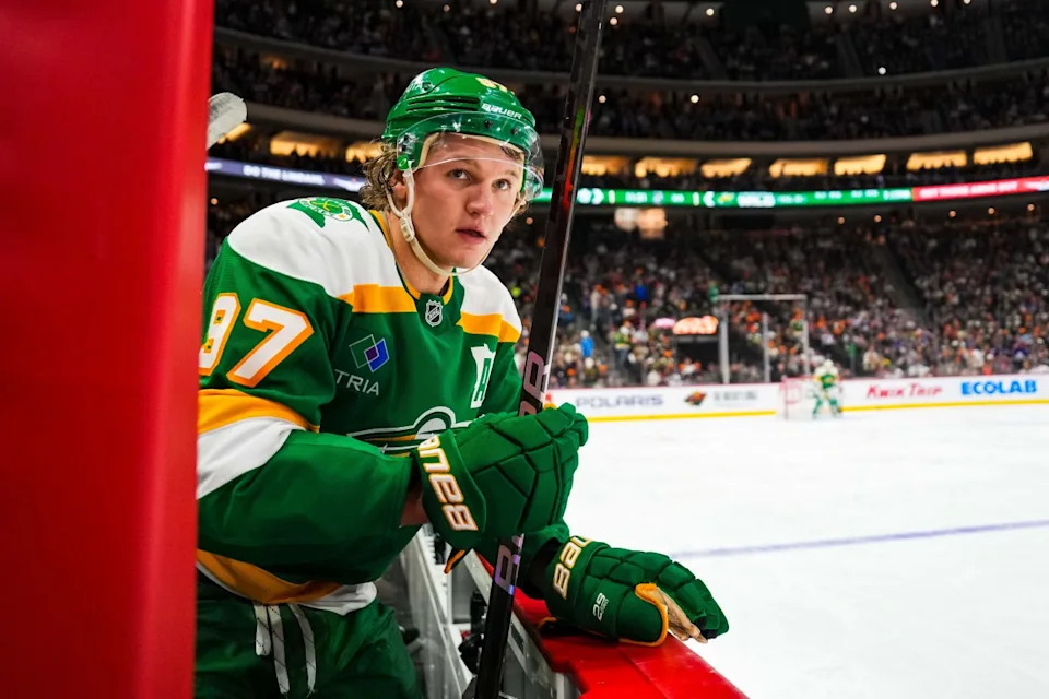 Minnesota Wild left wing Kirill Kaprizov (97) looks on from the bench.Brace Hemmelgarn-Imagn Images