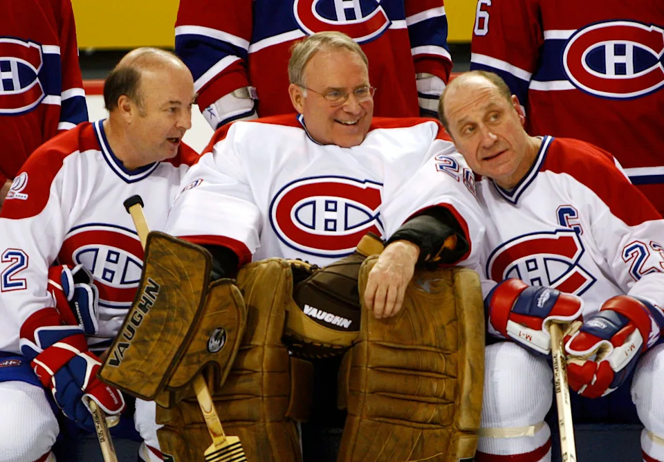 Former Montreal Canadiens greats Steve Shutt (L), Ken Dryden (C) and Bob Gainey talk during a ceremony to celebrate the Canadiens' 100th anniversary.