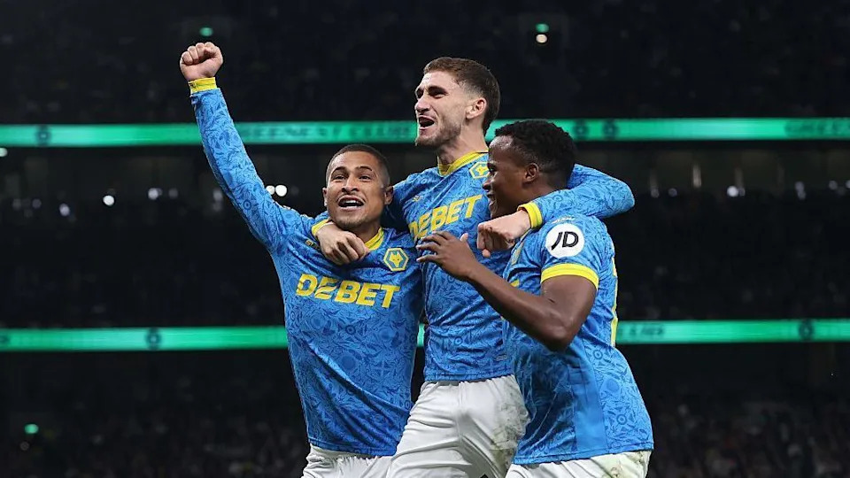 Santiago Bueno celebrating with Joao Gomes and Jhon Arias