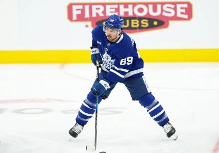 Oct 19, 2024; Toronto, Ontario, CAN; Toronto Maple Leafs left wing Nicholas Robertson (89) skates during the warmup before a game against the New York Rangers at Scotiabank Arena. Mandatory Credit: Nick Turchiaro-Imagn Images