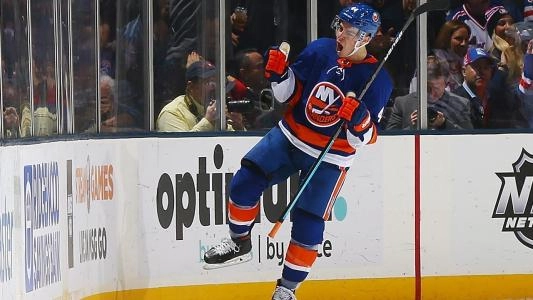 Jean-Gabriel Pageau celebrating a goal with the New York Islanders.