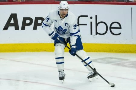 May 1, 2025; Ottawa, Ontario, CAN; Toronto Maple Leafs center Auston Matthews (34) skates with the puck in game six of the first round of the 2025 Stanley Cup Playoffs against the Ottawa Senators at Canadian Tire Centre. Mandatory Credit: Marc DesRosiers-Imagn Images