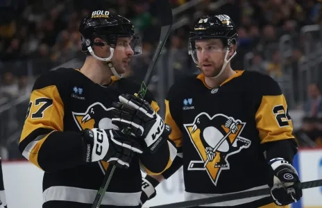 Pittsburgh Penguins Captain Sidney Crosby and defenseman Matt Grzelcyk.