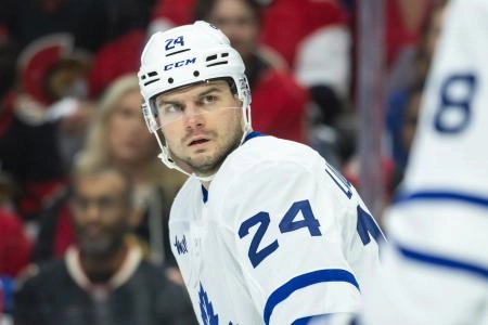 Apr 24, 2025; Ottawa, Ontario, CAN; Toronto Maple Leafs left wing Scott Laughton (24) gets in position for a faceoff in game three of the first round of the 2025 Stanley Cup Playoffs against the Ottawa Senators at Canadian Tire Centre. Mandatory Credit: Marc DesRosiers-Imagn Images