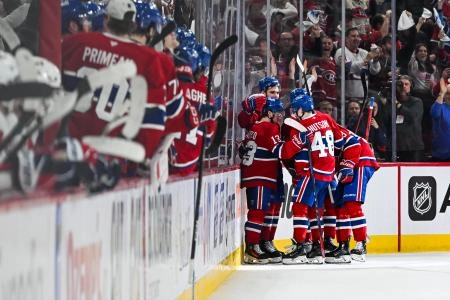 Apr 27, 2025; Montreal, Quebec, CAN; Montreal Canadiens right wing Cole Caufield (13) celebrates with his teammates his goal against the Washington Capitals during the second period in game four of the first round of the 2025 Stanley Cup Playoffs at Bell Centre. Mandatory Credit: David Kirouac-Imagn Images Apr 27, 2025; Montreal, Quebec, CAN; Montreal Canadiens right wing Cole Caufield (13) celebrates with his teammates his goal against the Washington Capitals during the second period in game four of the first round of the 2025 Stanley Cup Playoffs at Bell Centre. Mandatory Credit: David Kirouac-Imagn Images