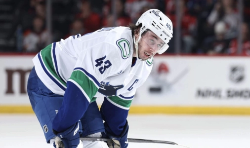Canucks captain Quinn Hughes in game action