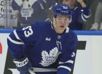 Sep 25, 2023; Toronto, Ontario, CAN; Toronto Maple Leafs forward Easton Cowan (53) skates during warm up before a game against the Ottawa Senators at Scotiabank Arena. Mandatory Credit: John E. Sokolowski-Imagn Images