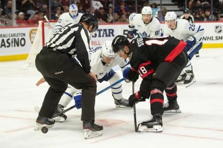 Toronto Maple Leafs center Dylan Gambrell faces off against Ottawa Senators left wing Tum Stutzle Toronto Maple Leafs center Dylan Gambrell faces off against Ottawa Senators left wing Tum Stutzle
