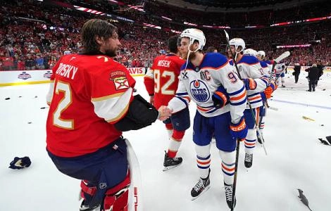 Edmonton Oilers shake hands with Stanley Cup champs Florida Panthers following game 6 of last year's Finals