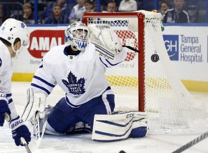 Dec 29, 2016; Tampa, FL, USA; Toronto Maple Leafs goalie Antoine Bibeau (30) makes a save against the Tampa Bay Lightning during the second period at Amalie Arena. Mandatory Credit: Kim Klement-Imagn Images