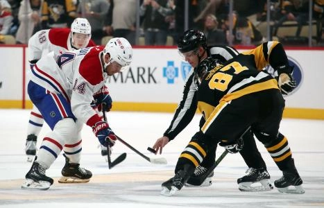 Nov 2, 2024; Pittsburgh, Pennsylvania, USA; Montreal Canadiens center Nick Suzuki (14) and Pittsburgh Penguins center Sidney Crosby (87) take a face-off during the second period at PPG Paints Arena. Mandatory Credit: Charles LeClaire-Imagn Images Nov 2, 2024; Pittsburgh, Pennsylvania, USA; Montreal Canadiens center Nick Suzuki (14) and Pittsburgh Penguins center Sidney Crosby (87) take a face-off during the second period at PPG Paints Arena. Mandatory Credit: Charles LeClaire-Imagn Images