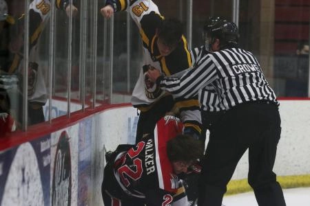 Simmons-Fischer in a fight while playing in the NAHL Simmons-Fischer in a fight while playing in the NAHL